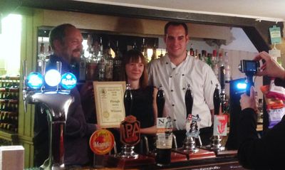 The plough receiving their pub of the year award in 2018